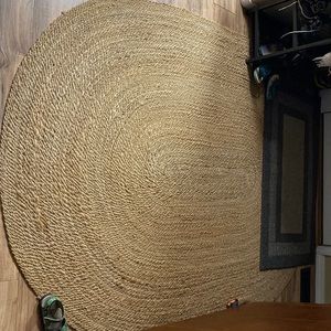 Hearth and hand jute rug from target. Natural color goes great with everything.